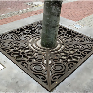 Ornamental Scroll Pattern Decorative tree-grate design, made to suit tree pit and paving layout.